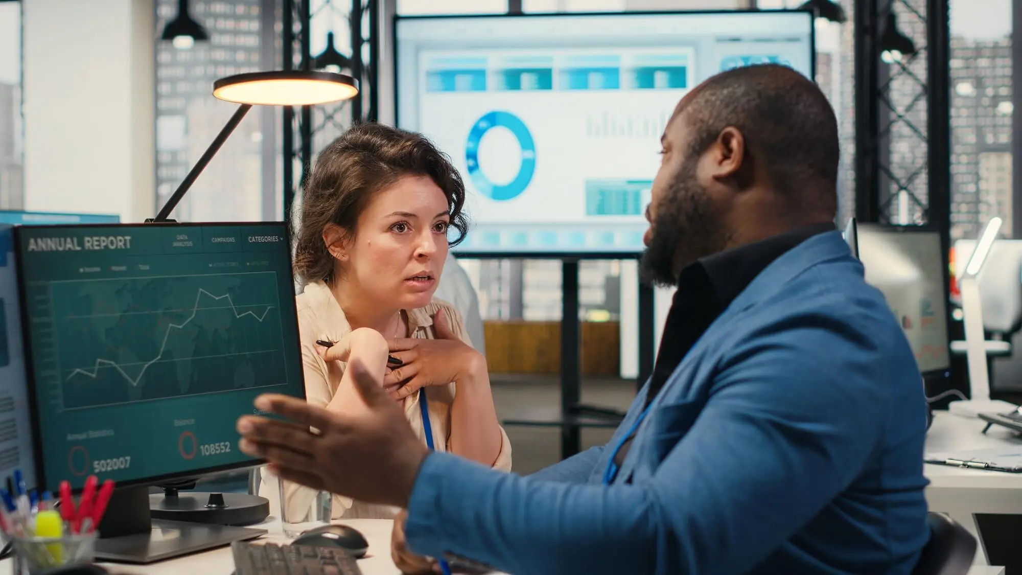Consultants discussing analytics